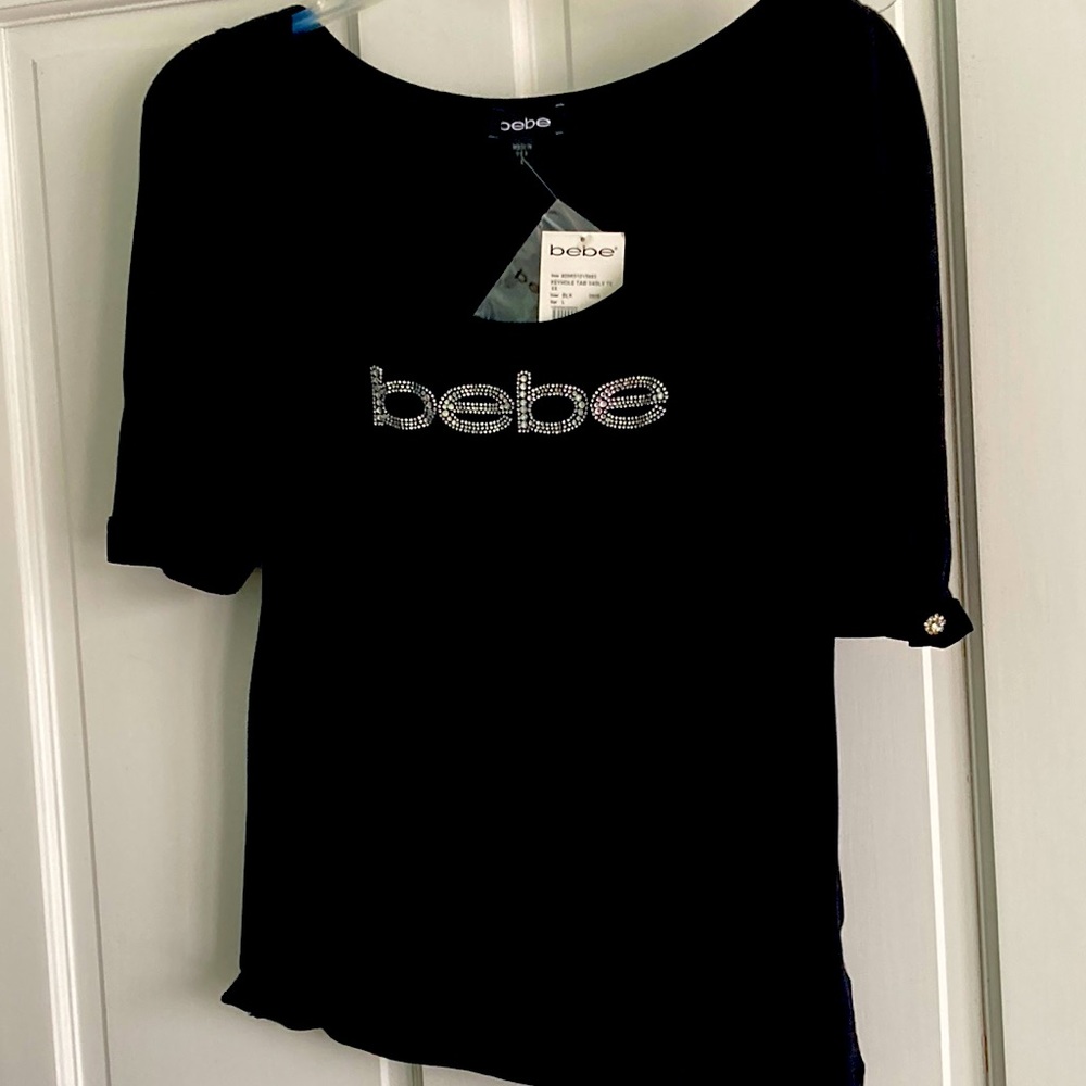 Bebe shirt size L with keyhole sleeve NEW WITH TAGS